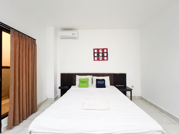 Bedroom 5, Urbanview Hotel Grand Pudjawan near Kuta Beach, Badung