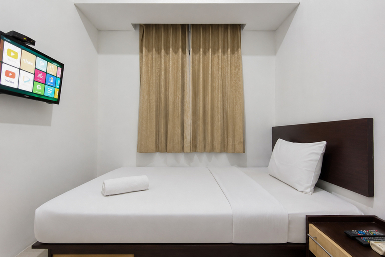 Bedroom 2, Comfortable and Simple 2BR at Apartment Skyland Jatinangor by Travelio, Sumedang