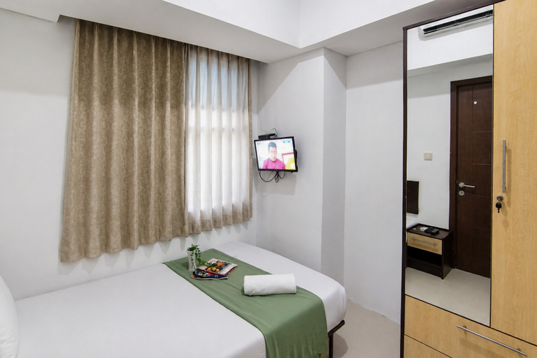 Bedroom 5, Comfortable and Simple 2BR at Apartment Skyland Jatinangor by Travelio, Sumedang