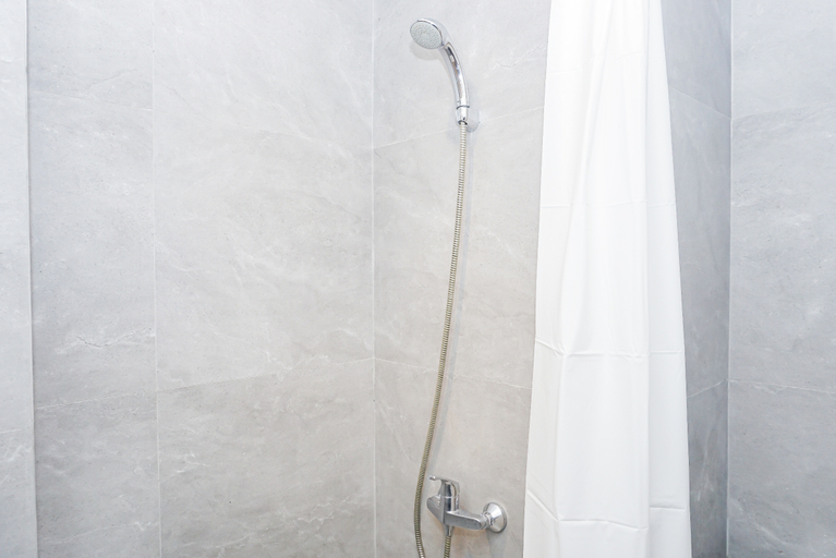 Bathroom 4, Charming Modern Studio at Apartment Mustika Golf Residence By Travelio, Cikarang