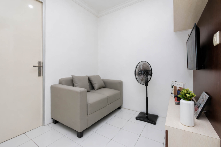 Living Room 3, Good Homey 2BR at Apartment Menteng Square By Travelio, Jakarta Pusat
