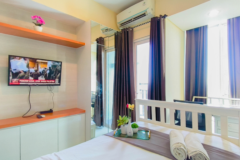 Bedroom 2, Urban Minimalist Studio at Apartment Tamansari Papilio By Travelio, Surabaya