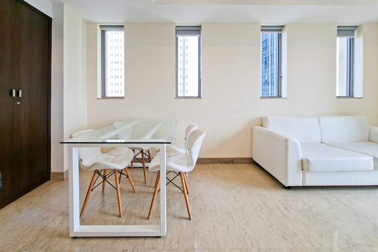 Living Room 5, Warm Space 2BR at Apartment Branz BSD City By Travelio, Tangerang Selatan