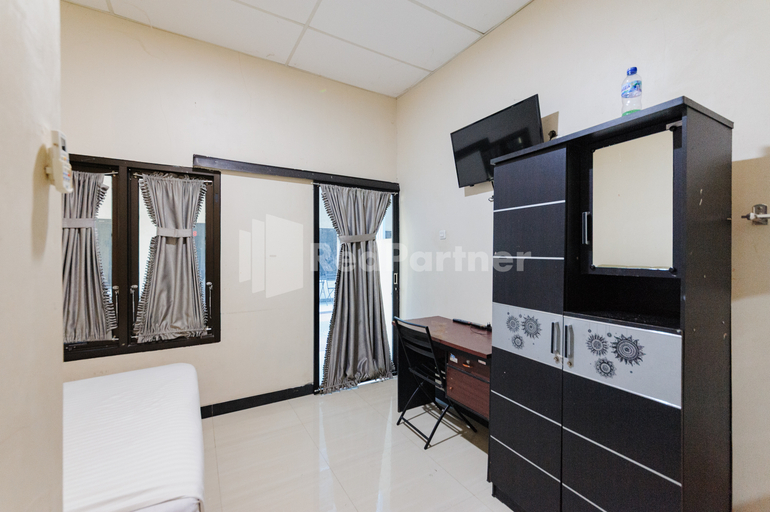 Others 4, Wisma Merdeka Syariah RedPartner, Palembang