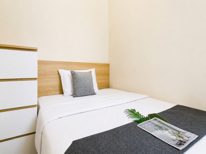 Bedroom 2, Bright and Homey 2BR at Apartment Meikarta District 1 By Travelio, Cikarang