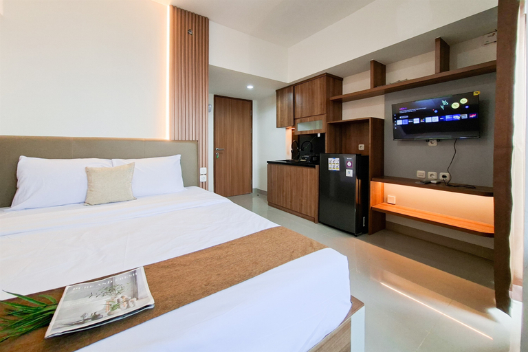 Bedroom 2, Bright and Warm Studio Room at Apartment Cisauk Point By Travelio, Tangerang