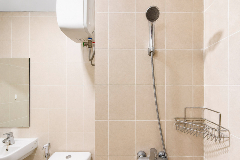 Bathroom 3, Bright and Homey 2BR at Apartment Parahyangan Residence By Travelio, Bandung