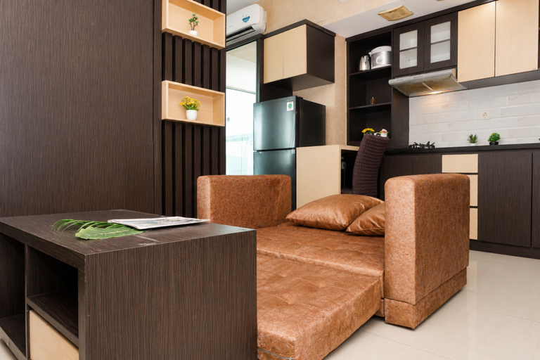 Living Room 4, Functional and Cozy Studio at Apartment Grand Kamala Lagoon By Travelio, Bekasi