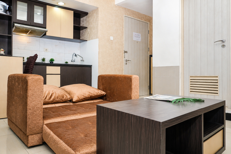 Living Room 5, Functional and Cozy Studio at Apartment Grand Kamala Lagoon By Travelio, Bekasi