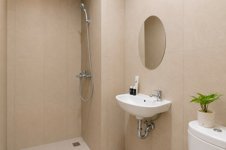 Bathroom 5, Modern and Convenient Studio at Apartment Kyo Society By Travelio, Surabaya