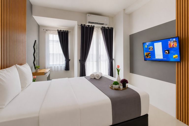 Bedroom 2, Modern and Convenient Studio at Apartment Kyo Society By Travelio, Surabaya