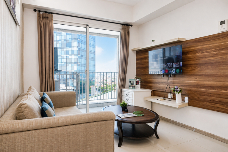 Living Room 4, Chic and Cozy 1BR at Apartment Casa Grande By Travelio, Jakarta Selatan