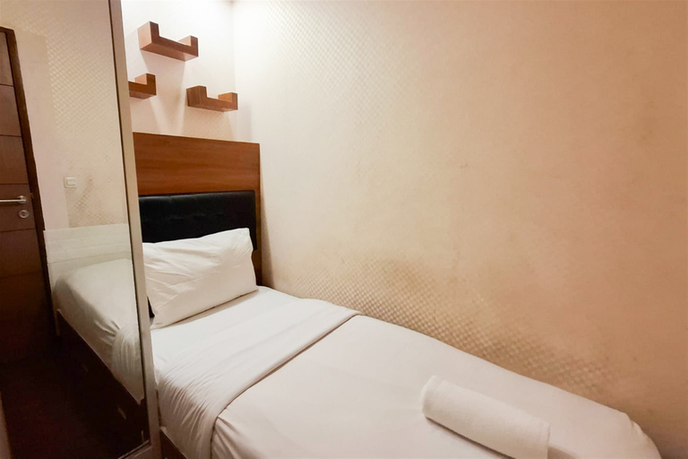 Bedroom 3, Cozy and Homey 2BR at Apartment Vida View Makassar By Travelio, Makassar