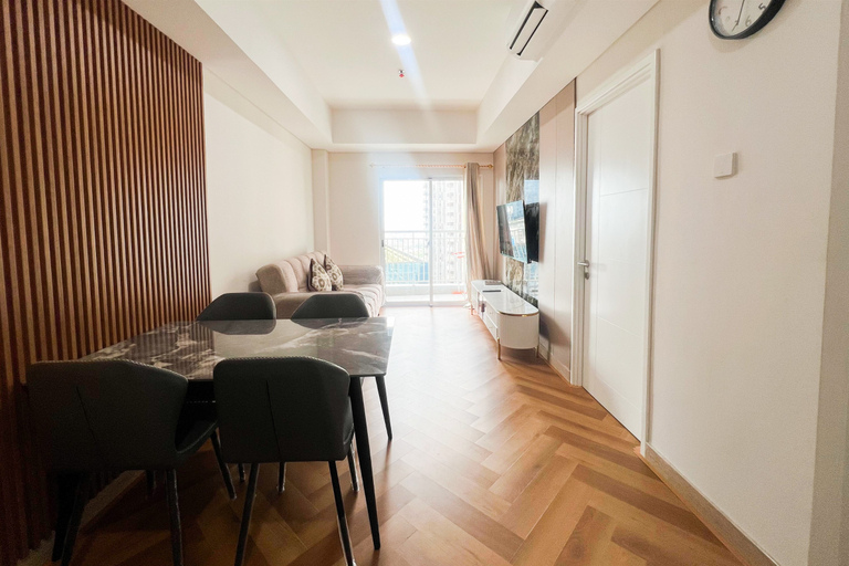 Living Room 2, Great Value 2BR at Apartment Podomoro City Deli Medan By Travelio, Medan