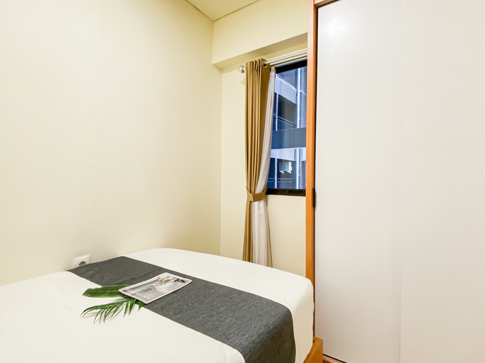 Bedroom 3, Sophisticated 2BR at Apartement Meikarta District 1 By Travelio, Cikarang