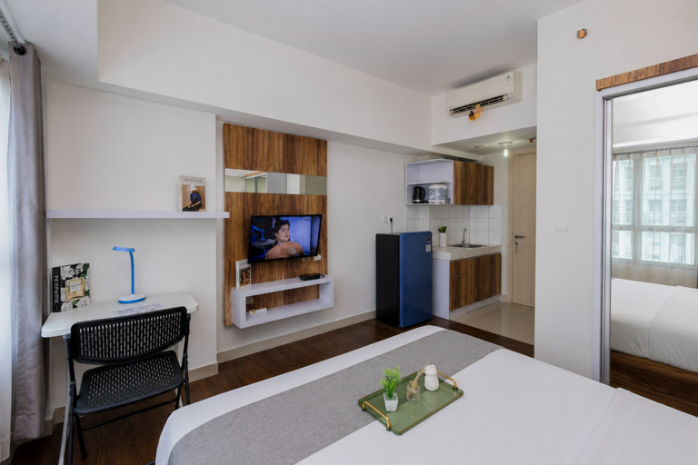 Bedroom 5, Modern Sleek Studio at Apartment Springlake Summarecon Bekasi By Travelio, Bekasi