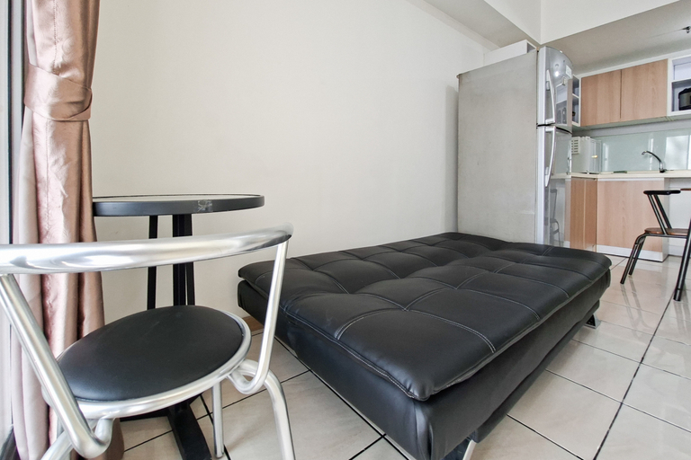 Living Room 3, Simple 2BR with City View at Apartment M-Town Residence By Travelio, Tangerang