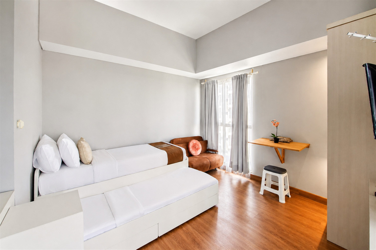 Bedroom 4, Bright Comfortable Studio at Apartment Casa de Parco By Travelio, Tangerang