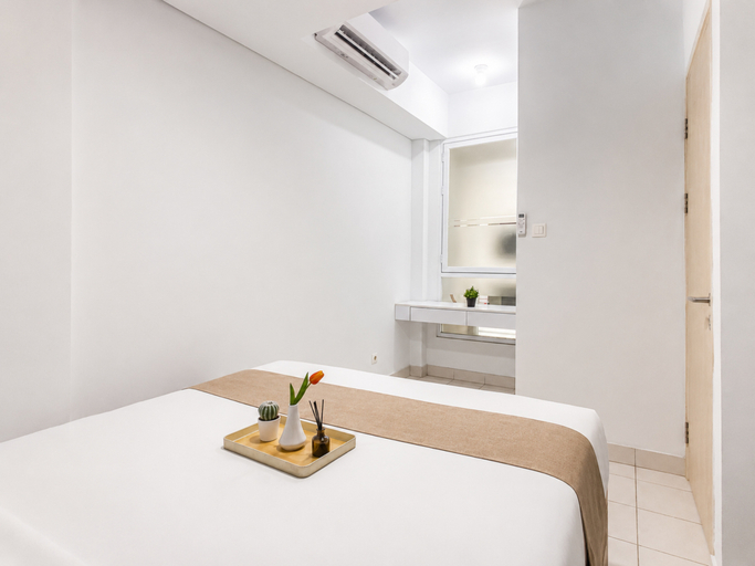 Bedroom 4, Cozy Compact 2BR at Apartment Patraland Urbano By Travelio, Bekasi