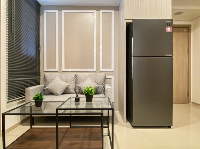 Living Room 3, Versatile Smart 2BR at Apartment Meikarta District 2 By Travelio, Cikarang