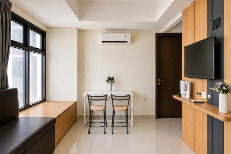 Living Room 3, Tranquil and Warm 2BR at Apartment Pollux Chadstone By Travelio, Cikarang