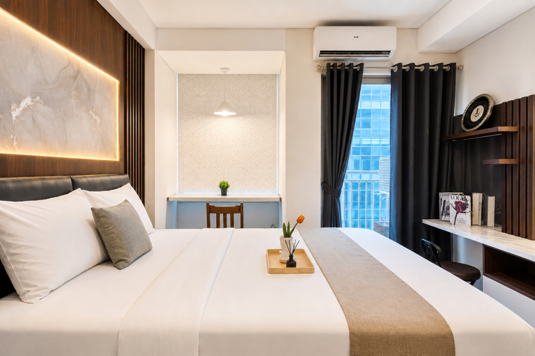 Bedroom 3, Restful Studio Room at Tamansari Iswara Apartment By Travelio, Bekasi
