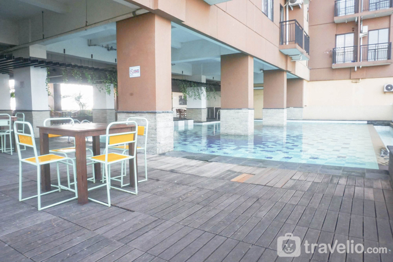 Swimming Pool 3, Contemporary 2BR at Apartment Tamansari Panoramic By Travelio, Bandung