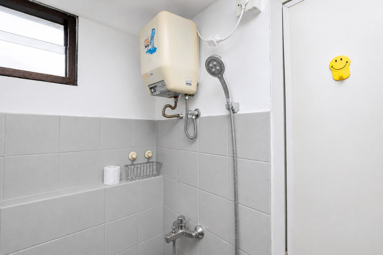 Bathroom 2, Tranquil and Modern Studio at Apartment Kebagusan City By Travelio, Jakarta Selatan