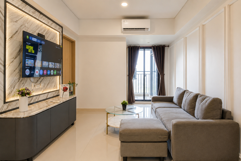 Living Room 2, Lavish and Elegant 2BR Apartment Meikarta District 1 By Travelio, Cikarang