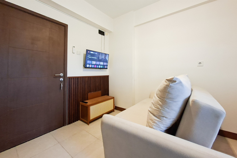 Living Room 5, Refined and Chic 1BR at Apartment Loftvilles City By Travelio, Tangerang Selatan