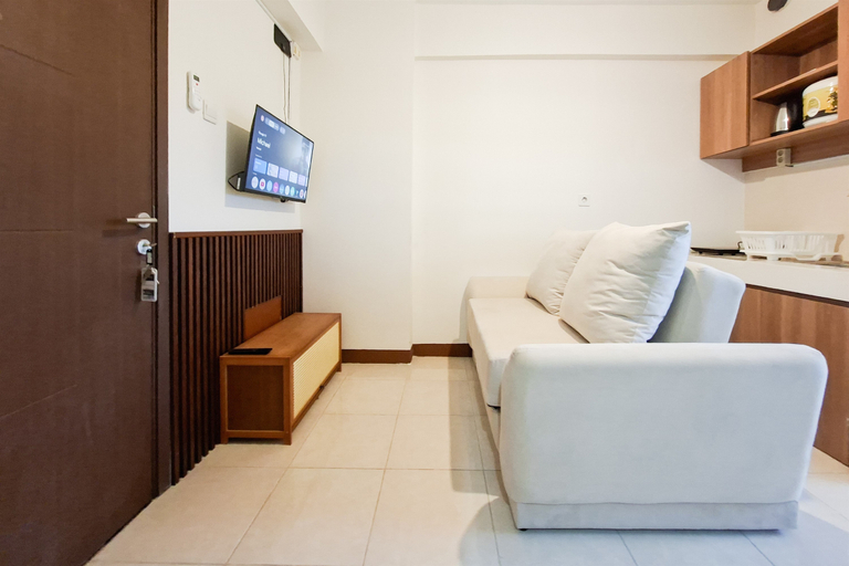 Living Room 4, Refined and Chic 1BR at Apartment Loftvilles City By Travelio, Tangerang Selatan