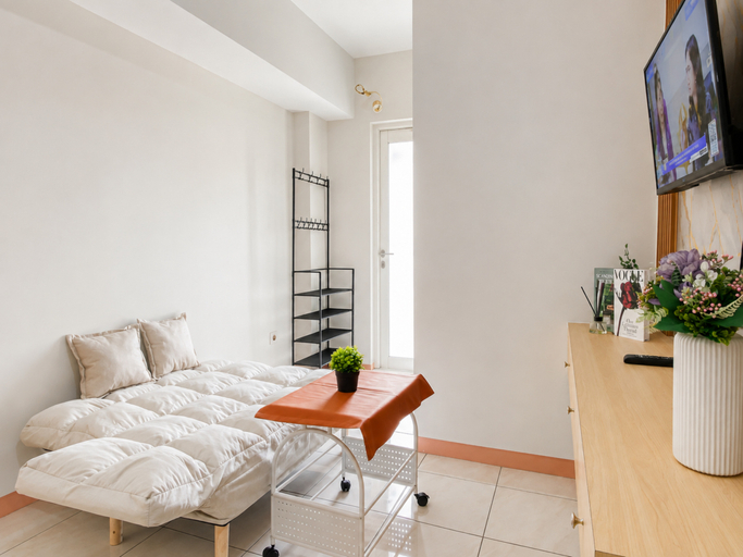 Living Room 5, Chic and Trendy 2BR at Apartment Springlake Summarecon Bekasi By Travelio, Bekasi