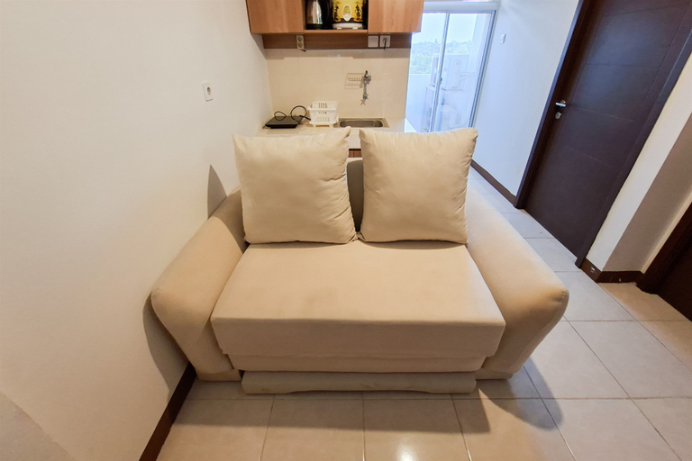 Living Room 3, Refined and Chic 1BR at Apartment Loftvilles City By Travelio, Tangerang Selatan