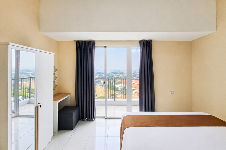 Bedroom 2, Relaxing and Cozy Stay 2BR at Apartment Casa de Parco By Travelio, Tangerang