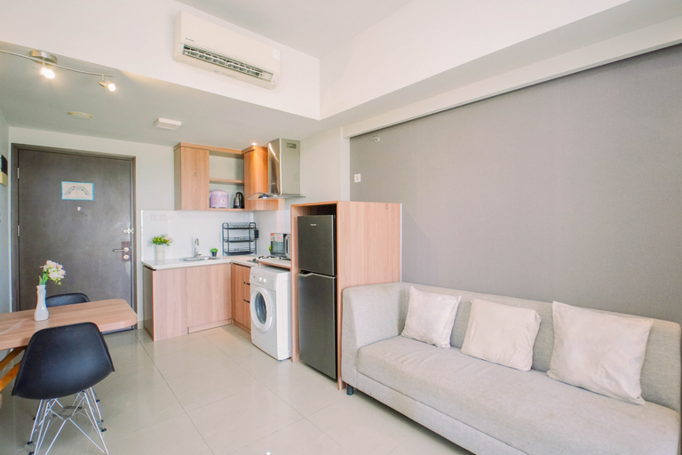 Living Room 3, Easy Smart Living 1BR at Apartment Mustika Golf Residence By Travelio, Cikarang