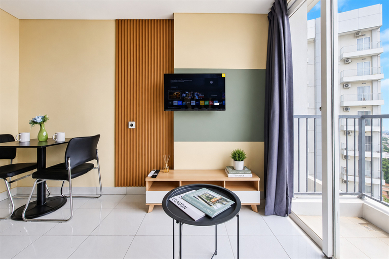 Living Room 2, Smart and Cozy Living 1BR at Apartment Casa de Parco By Travelio, Tangerang