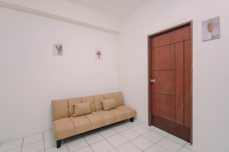 Living Room 4, Good and Homey 2BR at Apartment Kemang View By Travelio, Bekasi