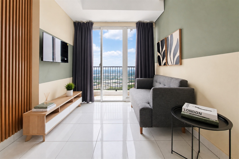 Living Room 4, Smart and Cozy Living 1BR at Apartment Casa de Parco By Travelio, Tangerang