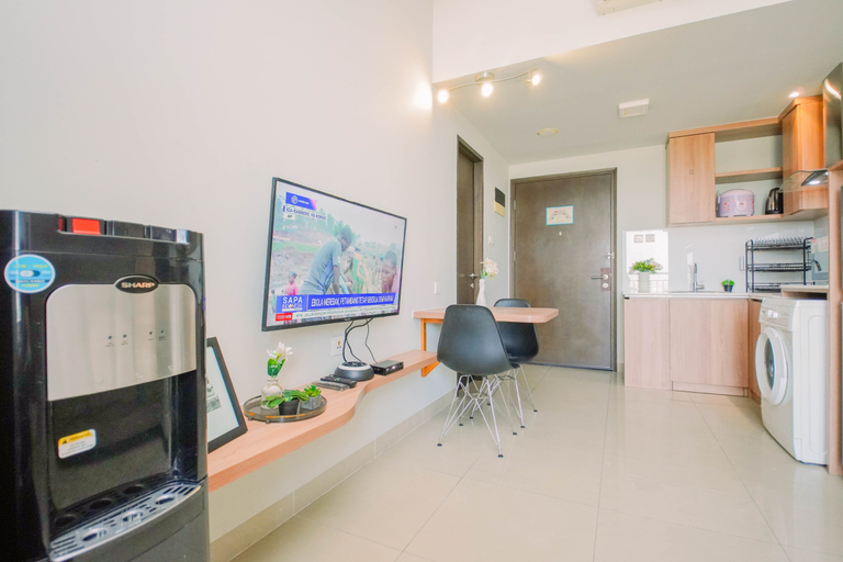 Living Room 4, Easy Smart Living 1BR at Apartment Mustika Golf Residence By Travelio, Cikarang