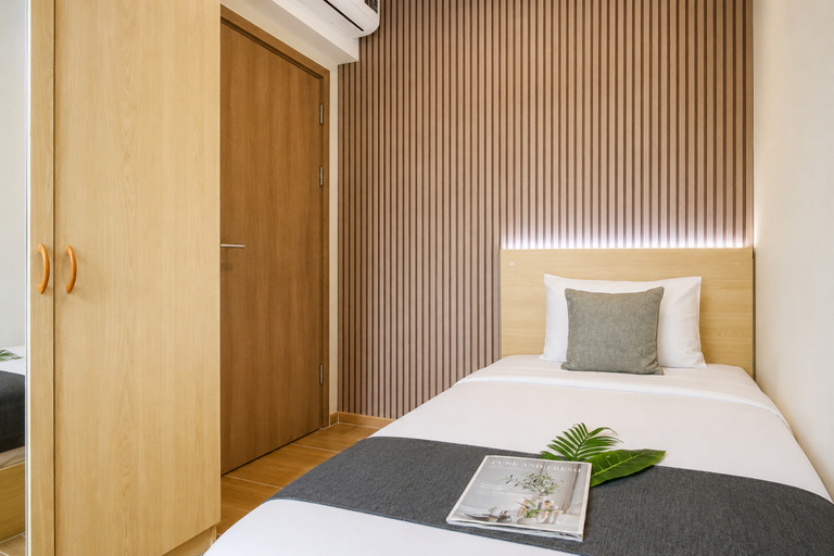 Bedroom 2, Capacious and Warm 2BR at Apartment Meikarta District 1 By Travelio, Cikarang