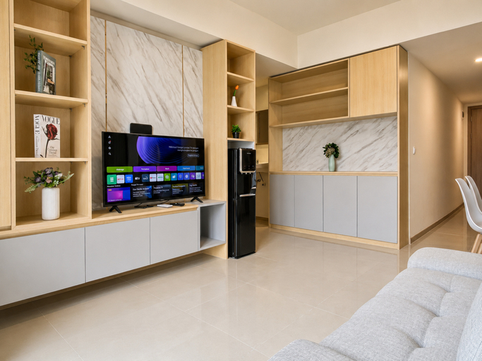Living Room 5, Capacious and Warm 2BR at Apartment Meikarta District 1 By Travelio, Cikarang