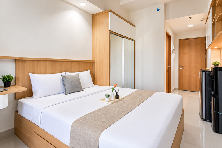 Bedroom 3, Pleasant Stay Studio at Apartment Evenciio Margonda By Travelio, Depok