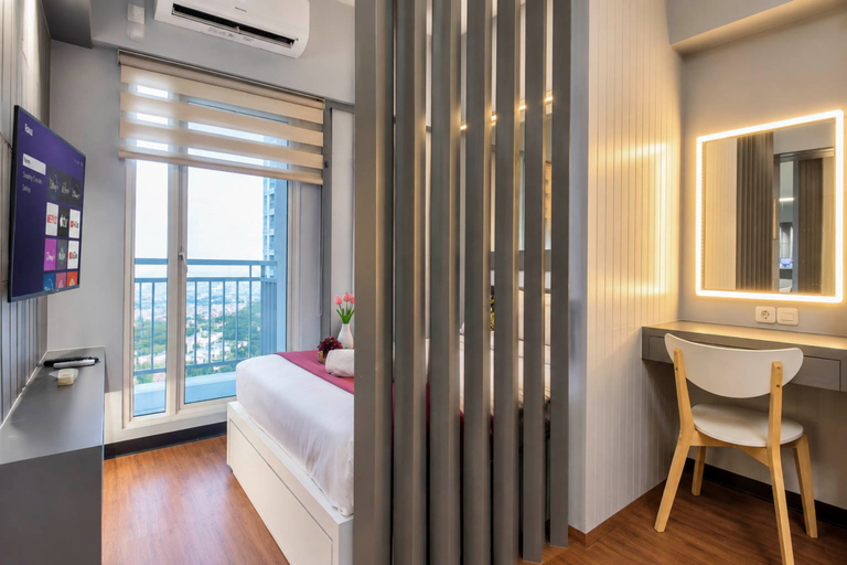 Bedroom 2, Bright and Cozy Studio at Apartment Tanglin Supermall Mansion By Travelio, Surabaya
