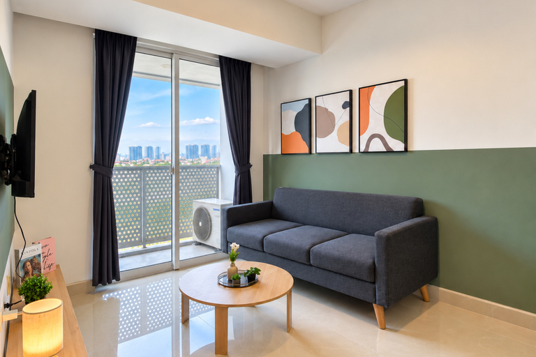 Living Room 2, Convenient 2BR at Apartment West Vista By Travelio, West Jakarta