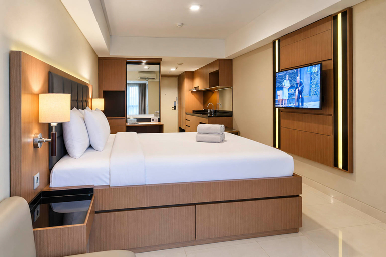 Bedroom 2, Warm and Sleek Studio at Apartment The Pinnacle By Travelio, Semarang