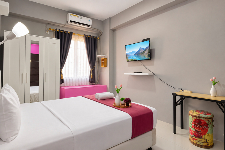 Bedroom 5, Modern Look Studio Room at Apartment Menara Rungkut By Travelio, Surabaya