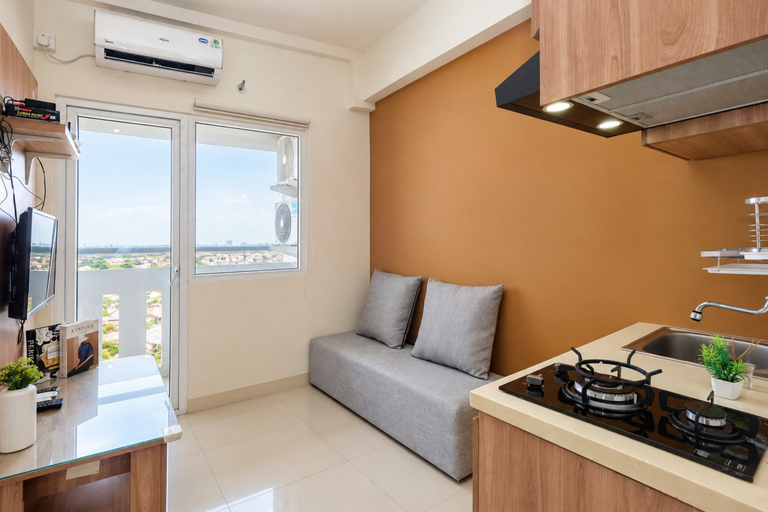Living Room 3, Comfortable Neat 2BR at Apartment Green Pramuka City By Travelio, Jakarta Pusat