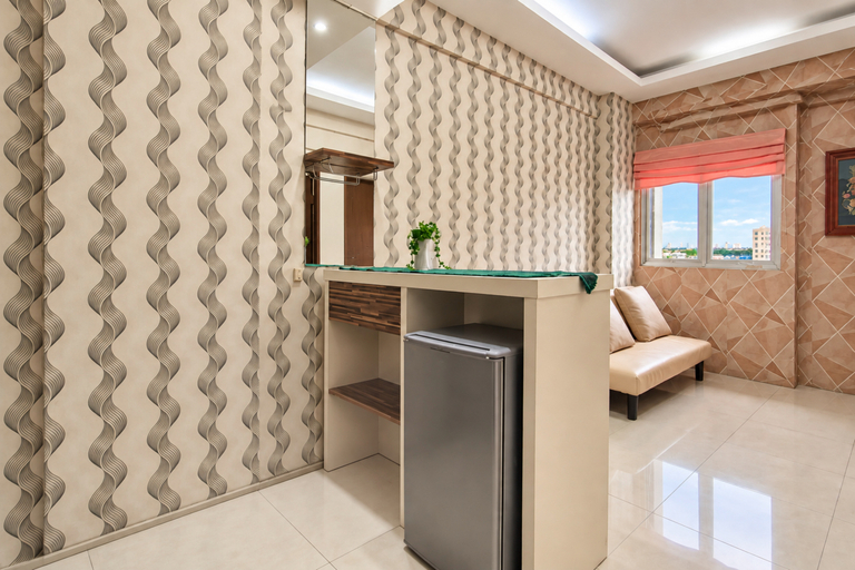 Living Room 2, Cozy and Modern Look 2BR at Apartment Suites @Metro By Travelio, Bandung