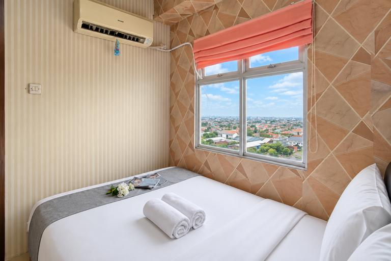 Bedroom 3, Cozy and Modern Look 2BR at Apartment Suites @Metro By Travelio, Bandung