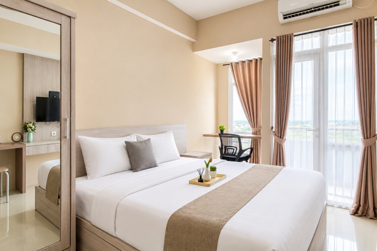 Bedroom 4, Timeless and Bright Studio at Apartment Vasanta Innopark By Travelio, Cikarang
